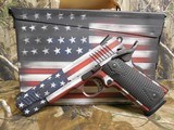 Citadel
M-1911,
with
Ammo
Can,
45
A.C.P. Single
Action,
5"
Barrel,
2 - 8+1
Round
Mags,
Black G10 Grip,
American Flag Cerakote Slid - 5 of 20