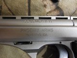 PHOENIX
22 - L.R.,
MODEL
HP22-A,
NICKEL / BLK.,
2- 10 + 1
ROUND
MAGAXINES,
TWO
BARRELS
3" & 5",
THUMB
SAFETY, - 8 of 21