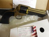 Ruger
2004
Wrangler
Revolver,
22 LR.
4.62" BARREL,
6
Round
Black
Checkered
Grip,
Burnt
Bronze
Cerakote, FACTORY
NEW
NI
BOX.. - 4 of 21