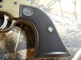 Ruger
2004
Wrangler
Revolver,
22 LR.
4.62" BARREL,
6
Round
Black
Checkered
Grip,
Burnt
Bronze
Cerakote, FACTORY
NEW
NI
BOX.. - 8 of 21