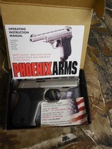 PHOENIX
22 - L.R.,
MODEL
HP22-A,
10 + 1
ROUND
MAGAXINE,
3"
BARREL, THUMB
SAFETY,
NICKEL/BLK
FACTORY
NEW
IN
BOX
MADE
IN
THE
U. - 1 of 26