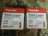 AGUILA
AMMO
9-MM
LUGER
115 GR.
F.M.J. -ROUND NOSE
300 ROUND - PACK,
BRASS
SHELLS, - 1 of 14