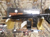 PANZER
BP-12,
PW ARMS INC, BP12, Black ,Anodized, 12- Gauge
3" MAGNUM,
2- 5+1 MAGS, Fixed Stock w/Adjustable Cheekpiece,
NEW - 8 of 26