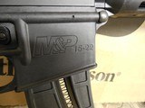 S&W M&P 15-22 SPORT,
.BUNDLE
GUN,
22-LR, 16.5"
BARREL,
25
ROUND
MAG.,
6-POSITION
STOCK,
M&P-0404 4x32 riflescope and a Caldwell XLA bip - 14 of 26