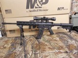 S&W M&P 15-22 SPORT,
.BUNDLE
GUN,
22-LR, 16.5"
BARREL,
25
ROUND
MAG.,
6-POSITION
STOCK,
M&P-0404 4x32 riflescope and a Caldwell XLA bip - 2 of 26