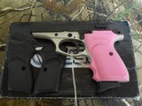 BERSA THUNDER 22LR T22DT with PINK and BLACK GRIPS - 1 of 1