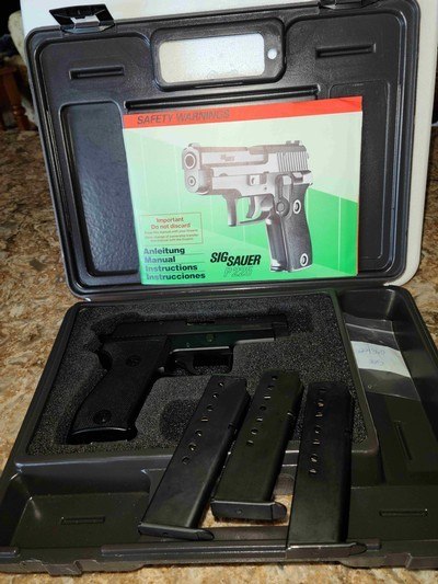Sig Sauer P225 with 3 factory Dovetail Mags.
VG Condition