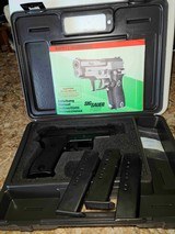 Sig Sauer P225 with 3 factory Dovetail Mags.
VG Condition