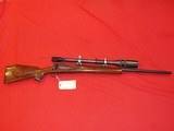 CUSTOM PRE 64 WINCHESTER 243 W/UNERTL 12X scope