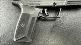 Ruger 5.7 Pistol in 5.7 x 28, Red-Dot installed, with three (3) 20 round Magazines and a new DeSantis leather scabbard holster. PRICED TO SELL! - 16 of 20