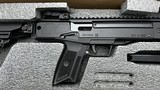 Ruger LC Carbine in 5.7x28, 10 round magazine, folding stock, iron sights, full length rail & MLOK, muzzle brake. NEW-IN-BOX, UNFIRED - PRICED TO SELL - 3 of 9