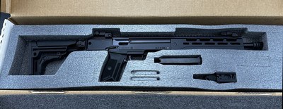 Ruger LC Carbine in 5.7x28, 10 round magazine, folding stock, iron sights, full length rail & MLOK, muzzle brake. NEW-IN-BOX, UNFIRED - PRICED TO SELL