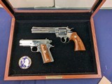 Superb 1986 Ltd. Edition Deluxe
Pair Colt Double Diamond Set Python/Officers Model Anniversary Pistols