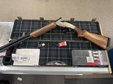 Pre-Owned Benelli 828U Silver Shotgun - 12 ga