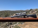 Savage Model 93 22 WMR stainless Nikon Buckmaster 3-9x stainless scope - 1 of 11