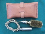 ENGLISH LEATHER POUCH WITH 8 BORE PULL THROUGH BRASS BRUSH. - 1 of 3