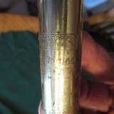 ANTIQUE BRASS C.M POWERS GUN CLEANER BY FARIES MFG CO. 1900 DECATUR, ILL. - 2 of 3