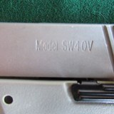 S&W SIGMA 40S&W with Ammo, cases & Holster - 4 of 7