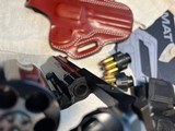 Ruger GP100 4 Inch with 4 holsters and 2 speedloaders - 5 of 10