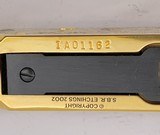 INVESTMENT ARMS WINCHESTER
94AE "A TRIBUTE TO OLD GLORY" 24K GOLD PLATED 1818-1960 MINNESOTA 1 OF 10 ENGRAVED WOOD W/ PRES CASE .45 COLT - 25 of 25