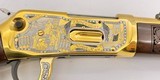 INVESTMENT ARMS WINCHESTER
94AE "A TRIBUTE TO OLD GLORY" 24K GOLD PLATED 1818-1960 MINNESOTA 1 OF 10 ENGRAVED WOOD W/ PRES CASE .45 COLT - 19 of 25