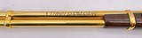 INVESTMENT ARMS WINCHESTER
94AE "A TRIBUTE TO OLD GLORY" 24K GOLD PLATED 1818-1960 MINNESOTA 1 OF 10 ENGRAVED WOOD W/ PRES CASE .45 COLT - 15 of 25