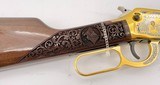 INVESTMENT ARMS WINCHESTER
94AE "A TRIBUTE TO OLD GLORY" 24K GOLD PLATED 1818-1960 MINNESOTA 1 OF 10 ENGRAVED WOOD W/ PRES CASE .45 COLT - 17 of 25