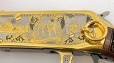 INVESTMENT ARMS WINCHESTER
94AE "A TRIBUTE TO OLD GLORY" 24K GOLD PLATED 1818-1960 MINNESOTA 1 OF 10 ENGRAVED WOOD W/ PRES CASE .45 COLT - 11 of 25