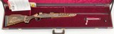 MOSSBERG 4X4 BOLT ACTION NRA "A HUNTING TRADITION" 22/100 MINNESOTA GOLD INLAY / ENGRAVED .338 WIN MAG - 2 of 24