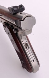 RUGER MARK III HUNTER STAINLESS SEMI AUTO 6 7/8" FLUTED BBL WOOD GRIPS W/ ORIG GREEN BOX, PAPERS, & 2 MAGS .22 LR 2005 - 13 of 17