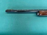 Remington 1100 Semi Automatic Shotgun Chambered in 12 Ga - Image 8 of 9
