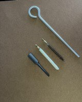 SMITH AND WESSON FACTORY ORIGINAL K-32 REVOLVER CLEANING KIT WITH KNURLED SIGHT TOOL
CIRCA 1940'S