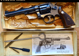 SMITH AND WESSON FACTORY ORIGINAL K-32 REVOLVER CLEANING KIT WITH KNURLED SIGHT TOOL
CIRCA 1940'S - 7 of 9