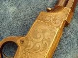 VOLCANIC REPEATING
NAVY
REVOLVER, IVORY GRIPS, ENGRAVED - 12 of 15
