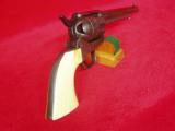 COLT SAAREVOLVER.45 COLTCALIBER - - IVORY GRIPS - 1 of 15