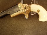 COLT,
GOLD INLAID,
ENGRAVED No. 3 THEUR
DERRINGER W/CASE - 9 of 20