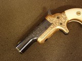 COLT,
GOLD INLAID,
ENGRAVED No. 3 THEUR
DERRINGER W/CASE - 14 of 20