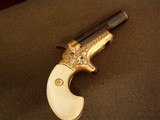 COLT,
GOLD INLAID,
ENGRAVED No. 3 THEUR
DERRINGER W/CASE - 7 of 20