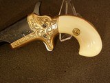 COLT,
GOLD INLAID,
ENGRAVED No. 3 THEUR
DERRINGER W/CASE - 10 of 20