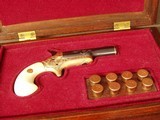 COLT,
GOLD INLAID,
ENGRAVED No. 3 THEUR
DERRINGER W/CASE - 1 of 20