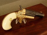 COLT,
GOLD INLAID,
ENGRAVED No. 3 THEUR
DERRINGER W/CASE - 4 of 20
