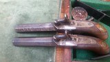 A like new pair of unmarked British Muff Pistols from the 1840-1850 era. - 2 of 4