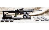 Bushmaster XM15-E2S 5.56X45 with CZ .22LR Upper Included