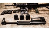 Bushmaster XM15-E2S 5.56X45 with CZ .22LR Upper Included - 13 of 16