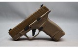 Springfield Armory ~ Hellcat ~ 9mm Luger - 2 of 3