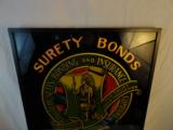 Circa 1920 Reverse Painted Glass Advertising Surety Bonds Features full Multi Color Indian Logo - 2 of 2