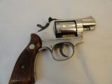 As New Smith & Wesson Model 15-4 in Factory Nickel
- 1 of 8