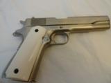 Near Mint Colt Model 1911 Nickel Series 70 .45 ACP with Ivory/Bone Grips - 1 of 11