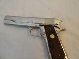 As New Colt 1911 Factory Nickel Series 70 .45 Automatic Pistol
(1974) - 1 of 10
