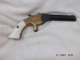 Engraved Spur Trigger Pocket Pistol by T.J. Stafford - 2 of 7